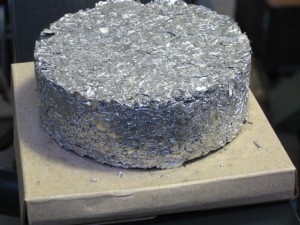 puck of recycled aluminum