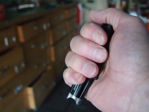 tactical flashlight fits in the palm of the hand